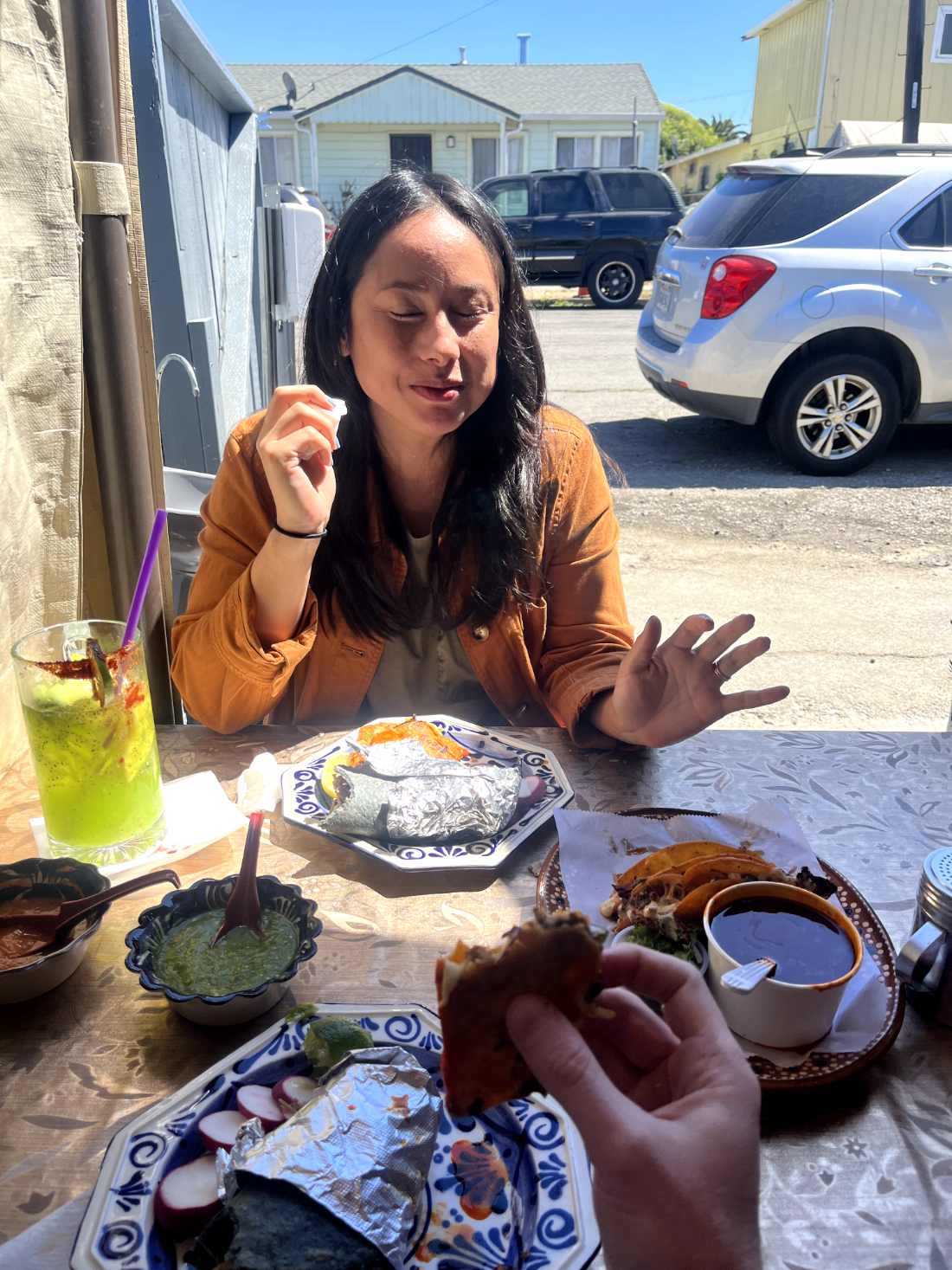 Kelly Barclay at a restaurant table